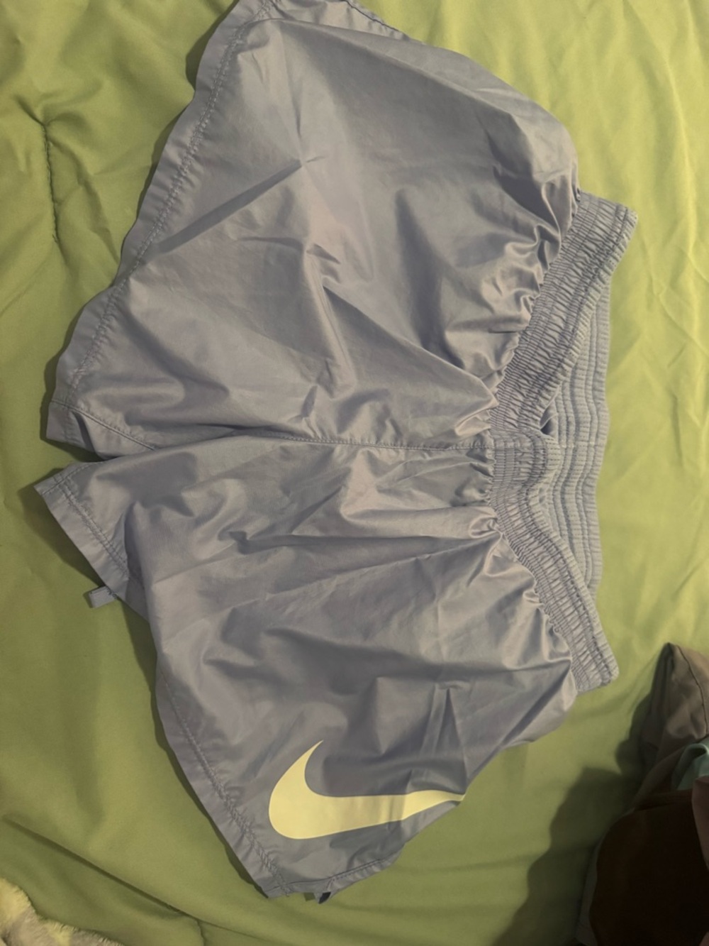 Nike Women's Lavender Athletic Running Shorts with White Swoosh